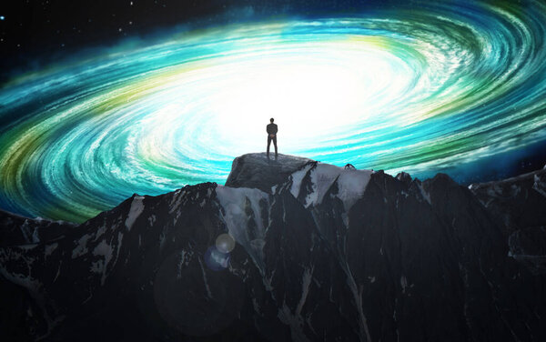 Human silhouette on a mountain against the background of a new galaxy