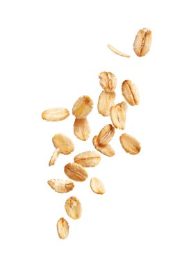 Beyaz arkaplanda düşen yulaf ezmesi