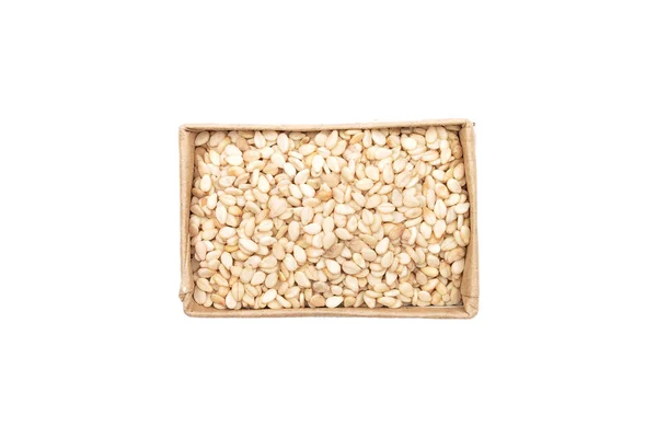 Sesame in small carton on white background — Stock Photo, Image