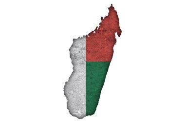 Madagaskar 'ın yıpranmış beton haritası ve bayrağı