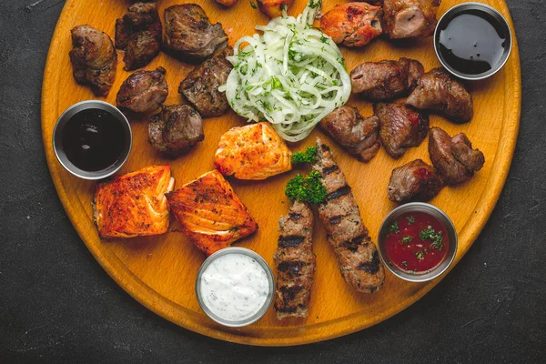 Assorted Grilled Meats Sauces Wooden Table Top View — Stock Photo, Image