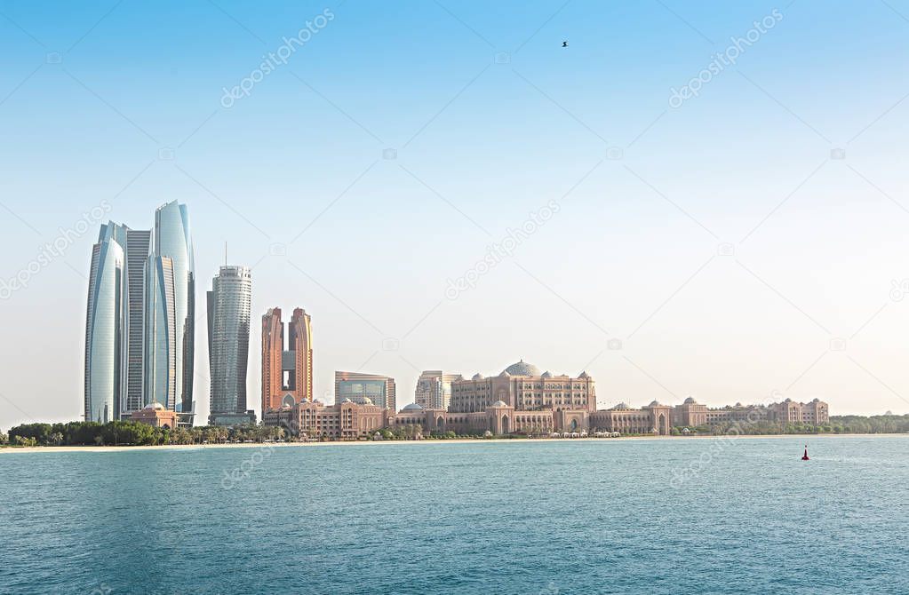 Emirates Palace and skyscrapers of Abu Dhabi. Abu Dhabi is the capital and the second most populous city of the United Arab Emirates 
