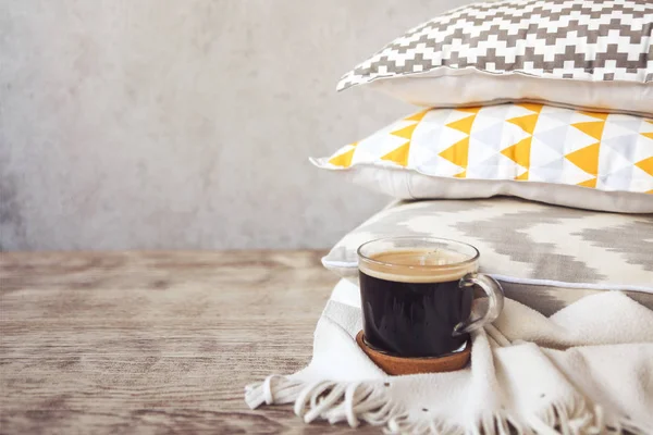 Yellow Grey Pillows Cup Coffee Wall Background Close — Stock Photo, Image