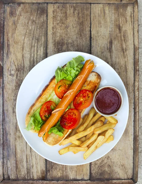 Plate French Fries Tasty Hot Dog Wooden Background — Stock Photo, Image