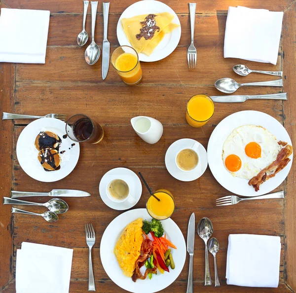 Continental breakfast with pancakes, eggs, bacon, orange jiuce a — Stock Photo, Image