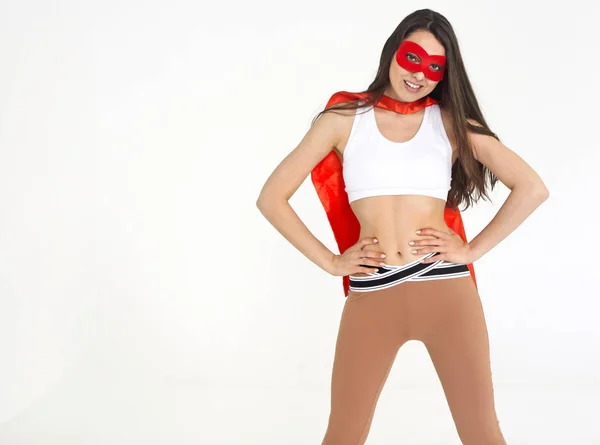 Jeune superwoman portant des vêtements de sport — Photo