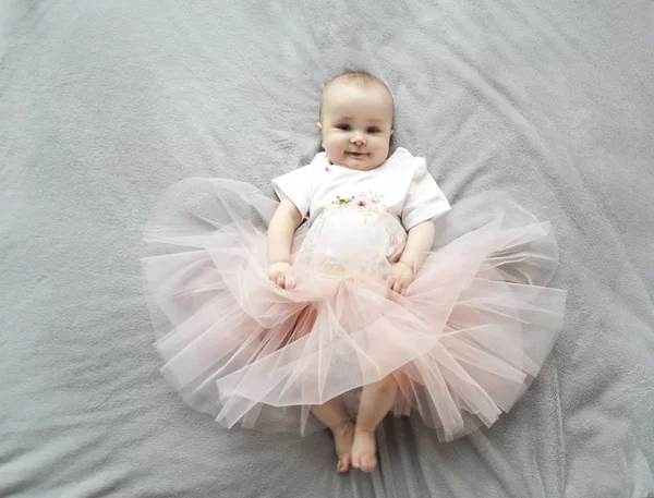 Adorable funny baby girl wearing tu-tu skirt — Stock Photo, Image