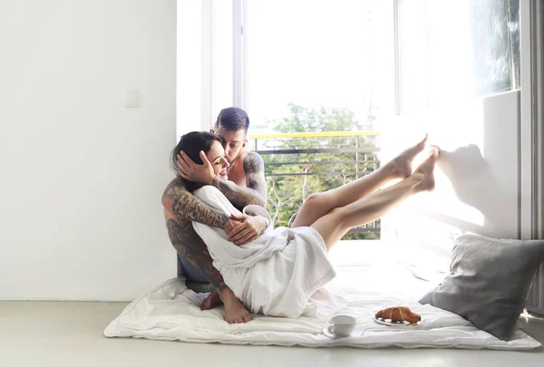 Young tattooed stylish couple in love — Stock Photo, Image
