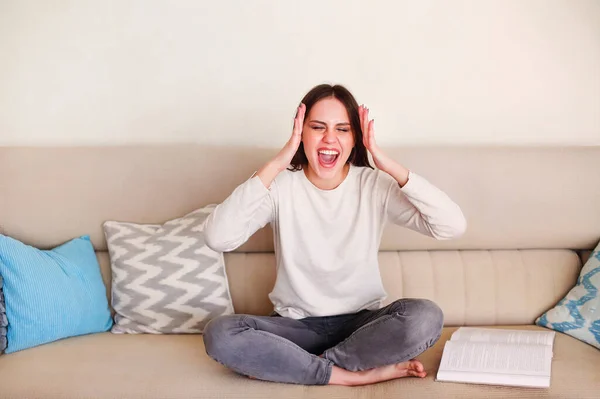 Annoyed Young Female Sitting Sofa Screaming While Working Remotely Laptop — Stock Photo, Image