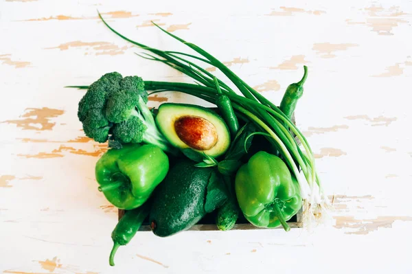 Top View Various Fresh Green Vegetables Placed Container Shabby Wooden — Stock Photo, Image