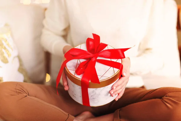 Unrecognizable Girl White Sweater Holding Present Box Tied Bright Red — Stock Photo, Image