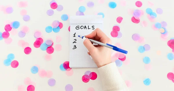 Female Hand Pen Writing New Year Goals Empty Notebook White — Stock Photo, Image