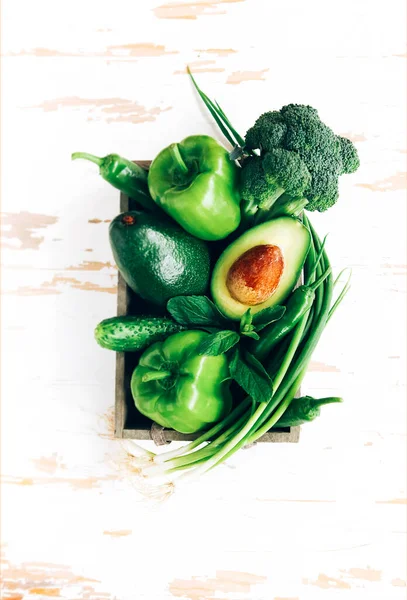 Top View Various Fresh Green Vegetables Placed Container Shabby Wooden — Stock Photo, Image