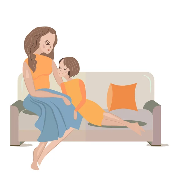 Η γυναίκα και η κόρη της κάθονται στον καναπέ. — Φωτογραφία Αρχείου