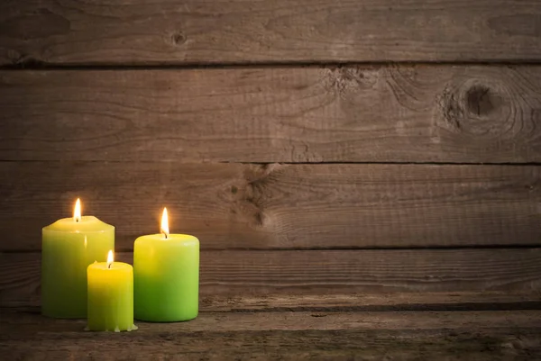 Green Candles Dark Wooden Background — Stock Photo, Image