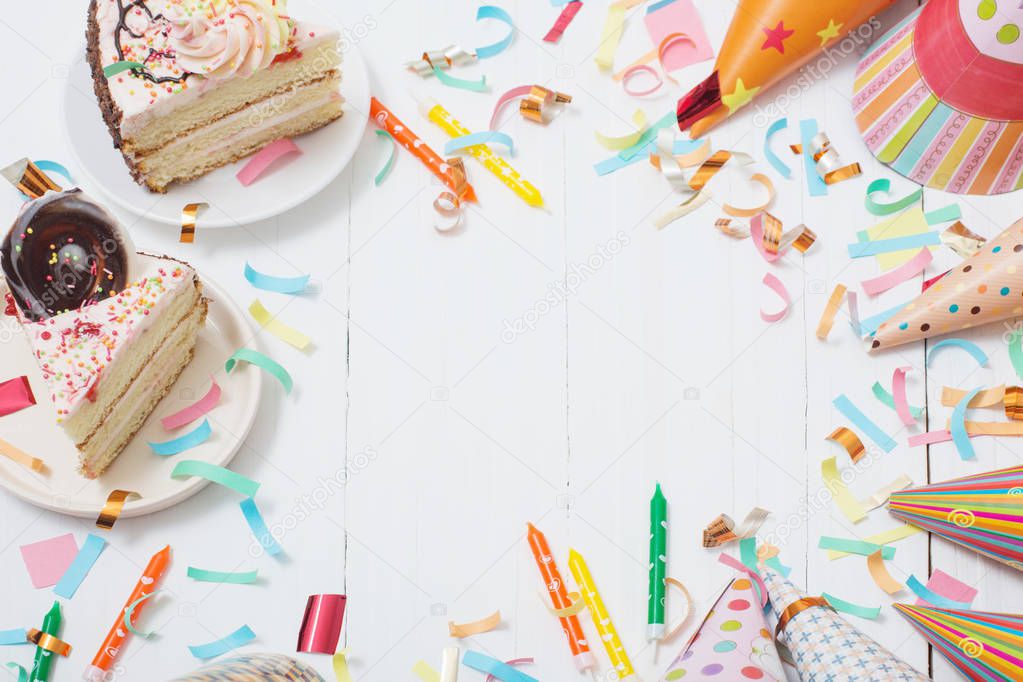 birthday cake and  decoration on white wooden background