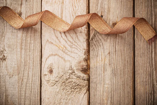 Golden Ribbon Old Wooden Background — Stock Photo, Image