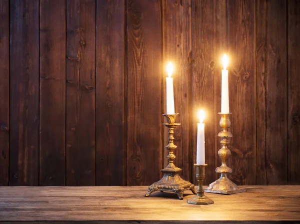 Burning Candle Old Dark Wooden Background — Stock Photo, Image