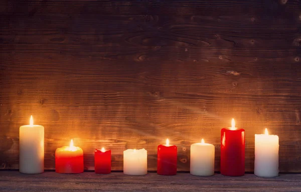 Burning Candle Old Dark Wooden Background — Stock Photo, Image