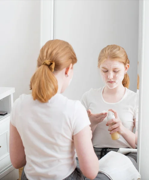 Fair Haired Teen Girl Puts Face Mask — Stock Photo, Image