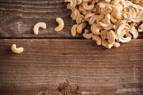 Anacardos Asados Sobre Fondo Mesa Madera Natural —  Fotos de Stock