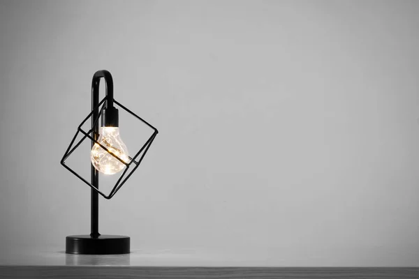 Metal black lamp in white interior — Stock Photo, Image