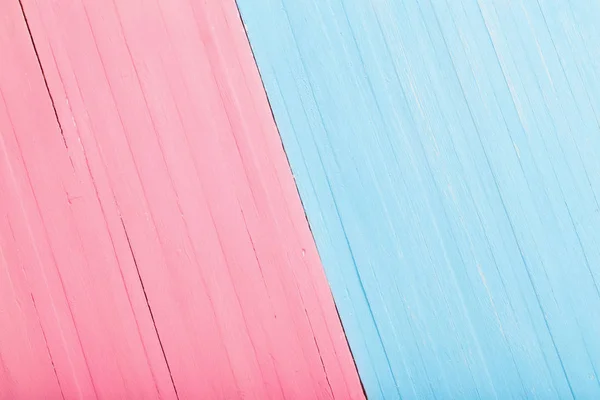 Fondo de madera rosa y azul. Concepto de hombre y mujer — Foto de Stock
