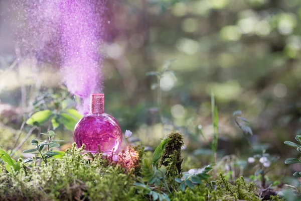 magic potion on bottle in forest