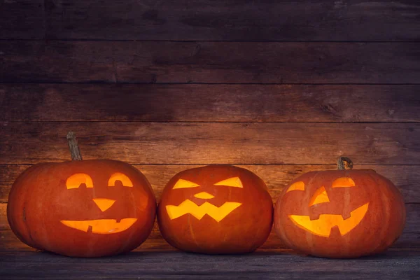 Halloween pumpkin on old wooden background — Stock Photo, Image