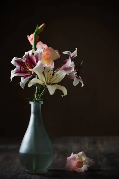 Still life with summer flowers in vase on dark background — Stock Photo, Image