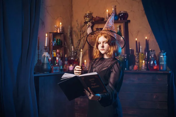Young witch in home. Halloween concept — Stock Photo, Image
