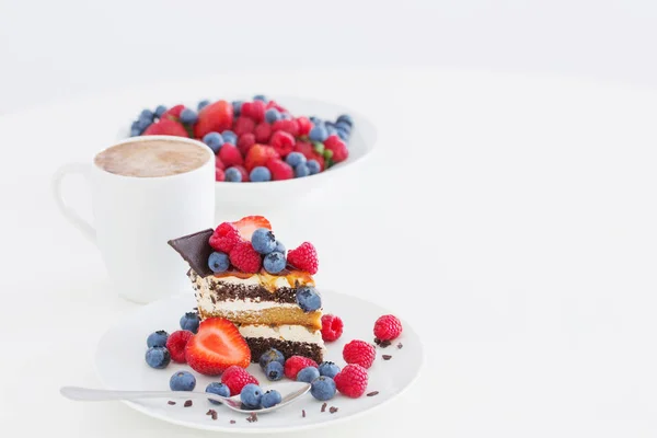 Healthy dessert with different berries on white background — Stock Photo, Image