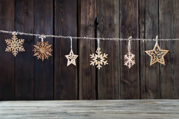 Wooden Christmas docorations on dark background — Stock Photo, Image