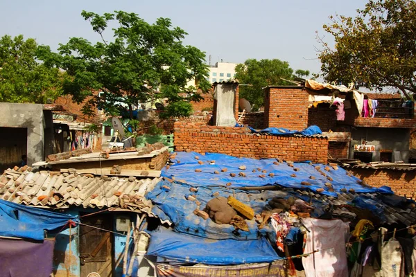 Hint şehrinin eteklerinde oor küçük evler — Stok fotoğraf