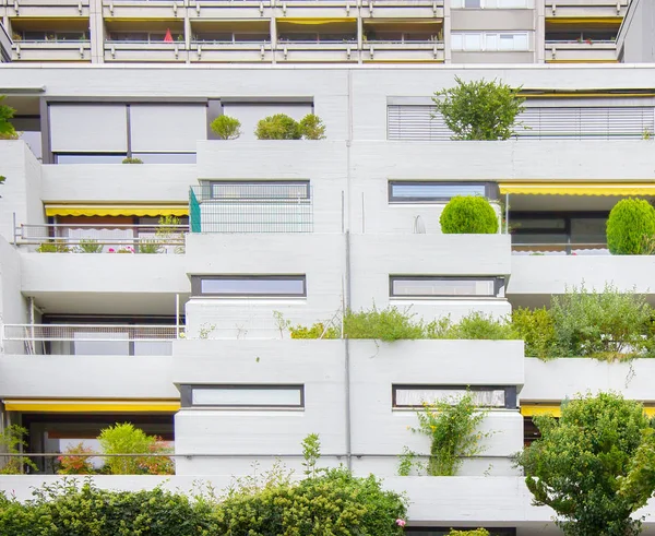 Residential building with many terraces as micro-garden. — Stock Image Residential building with many terraces as micro-garden. Stock Photo