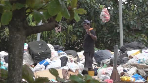 Sorting garbage in Asia, plastic bag in flight. Super slow motion 1000 fps — Stock Video