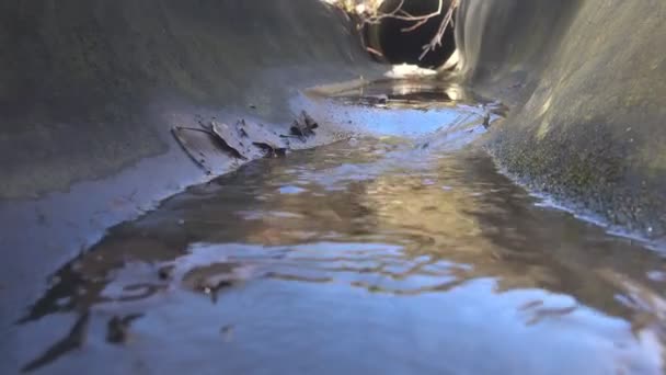 Drainage concrete ditch near road interchange — Stock Video