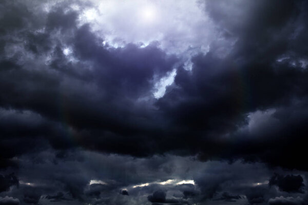 Sunlight in the Dark and Dramatic Storm Clouds