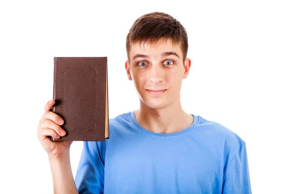 Молодой Человек Показывает Книгу Изолированную Белом Фоне — стоковое фото