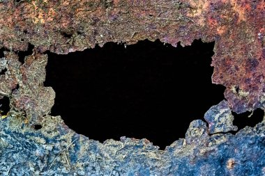 Rusty Metal 'deki Delik. Yakın plan.