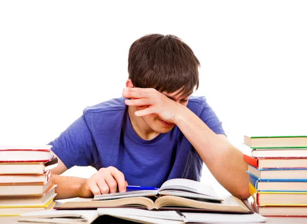 Trött Student Gnugga Ögon Den Skolan Skrivbord Isolerade Den Vita — Stockfoto