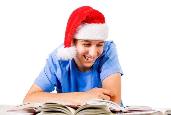 Étudiant Joyeux Santa Hat Avec Livre Sur Fond Blanc — Photo