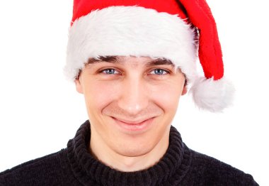 Beyaz arka plan üzerinde izole Santa şapka portre genç adam