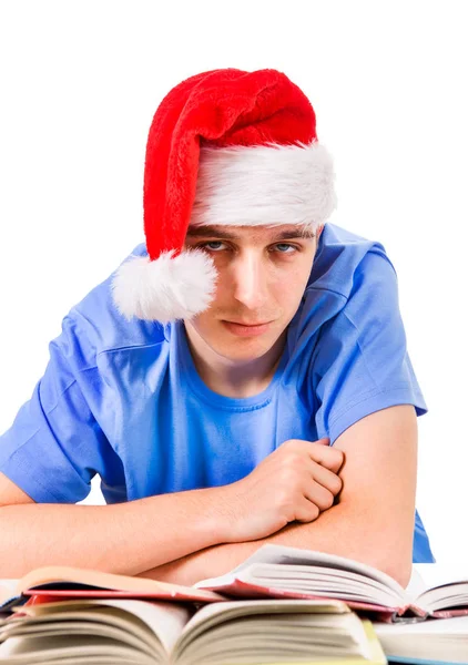 Étudiant Fatigué Ennuyé Dans Chapeau Père Noël Sur Bureau École — Photo