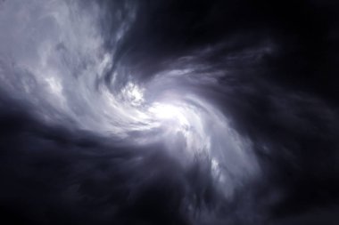 Blurred Swirl in the Dark Storm Clouds clipart