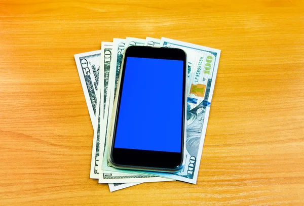 Geld Und Handy Auf Dem Holztisch — Stockfoto