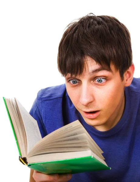 Έκπληκτος νεαρός άνδρας με ένα βιβλίο — Φωτογραφία Αρχείου
