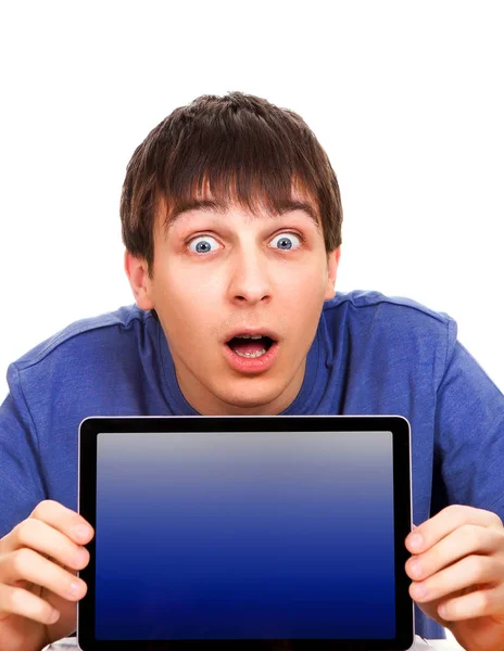 Joven sorprendido con una tableta — Foto de Stock