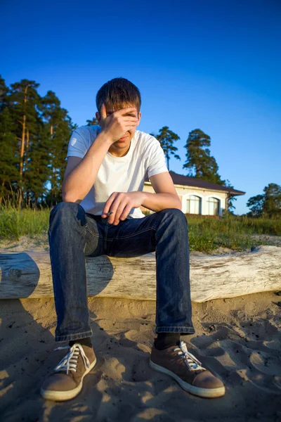 Triste unge mand udendørs - Stock-foto