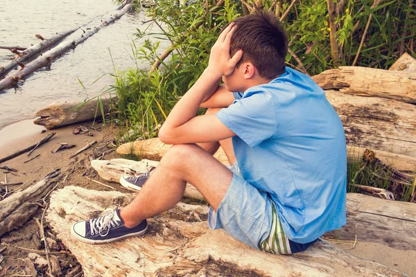 Triest jonge man — Stockfoto